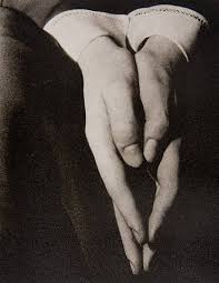 O'Keeffe's hands photographed by: Alfred Stieglitz
